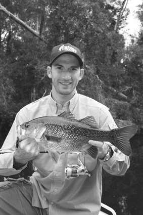 Brendan Kiely was all smiles with this lovely 48cm wild river bass, caught on an Ecogear SX40.